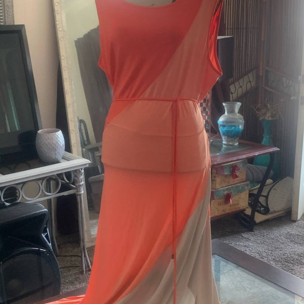 A peach, beige, and cream maxi dress worn once. 🥰
